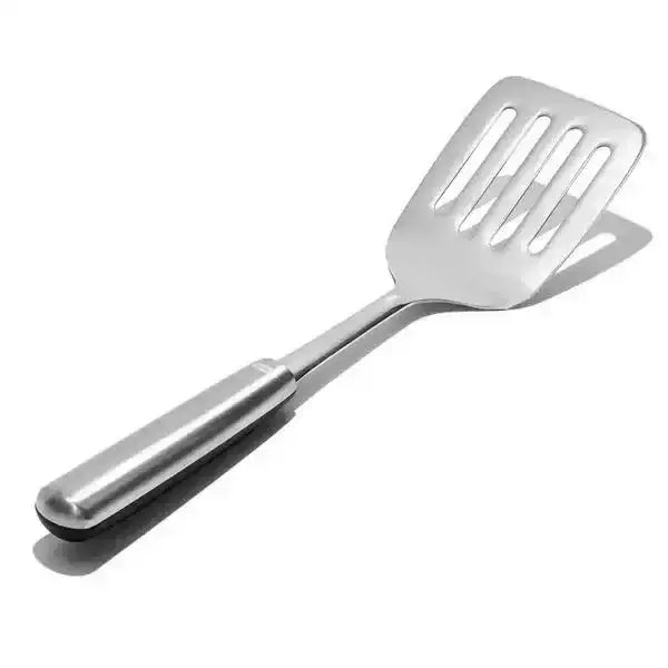Oxo stainless steel cooking turner with a polished finish and ergonomic handle for easy flipping and stirring