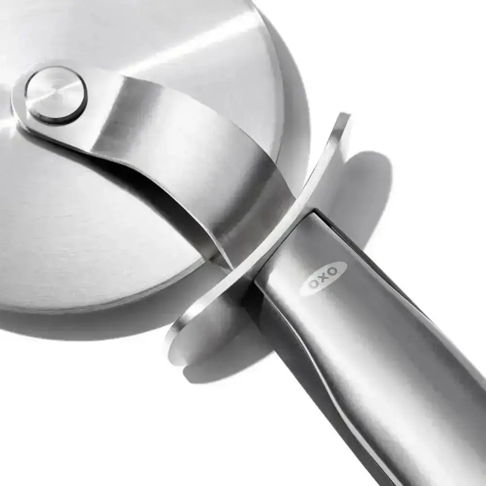 Oxo stainless steel pizza cutting wheel with sleek polished finish and ergonomic handle for easy slicing