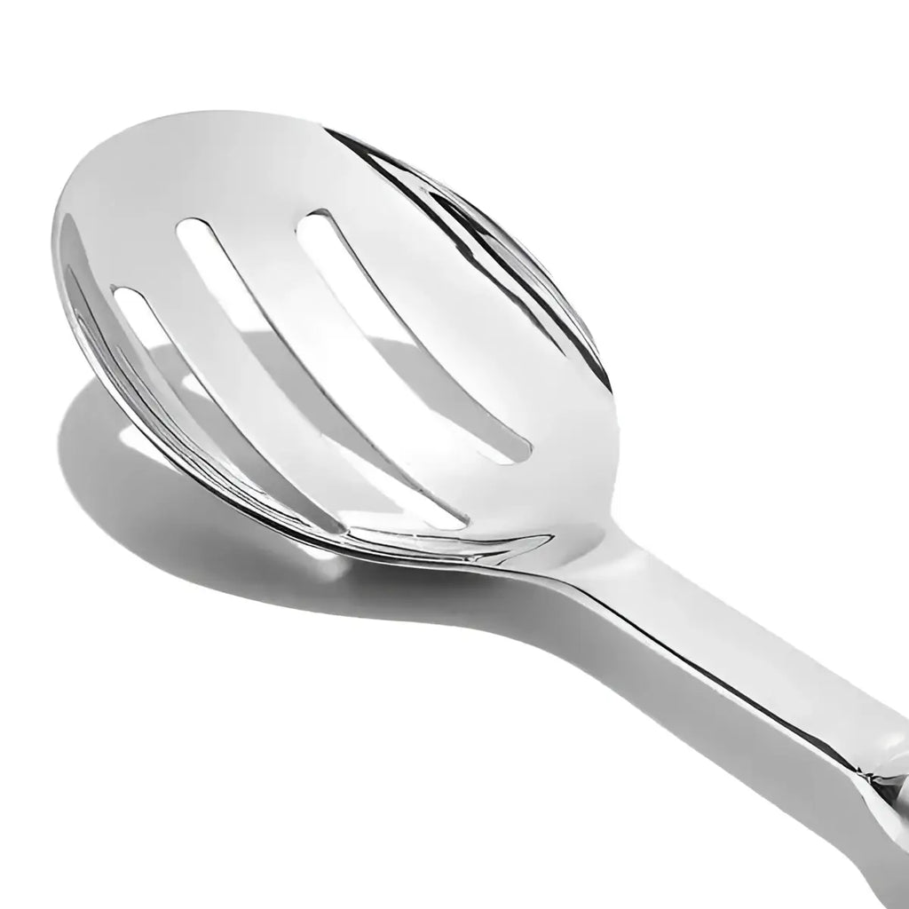 Oxo stainless steel slotted serving spoon in shiny metal with three parallel slots for draining liquids