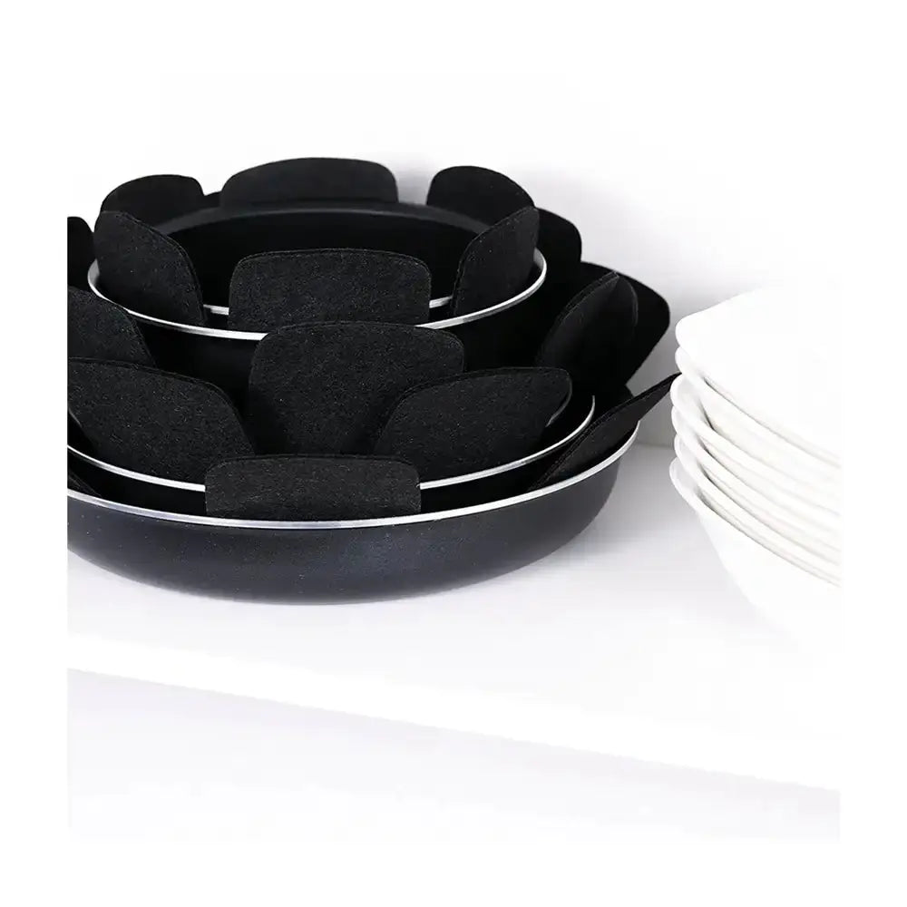 Set of black bowls with white interior on a white background