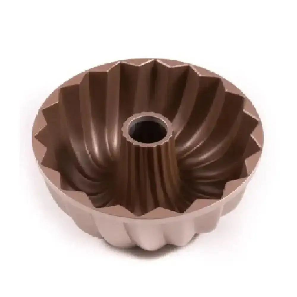 Metallic Bundt cake pan on a white background