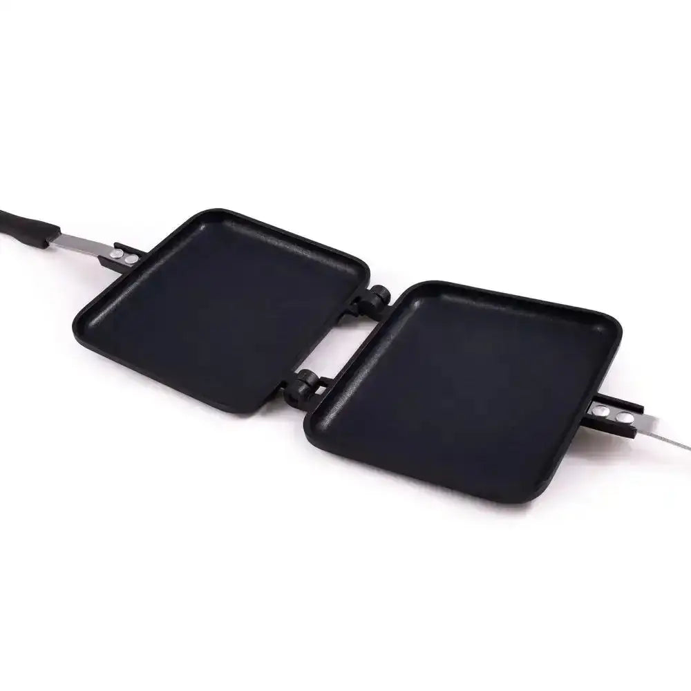 Black square griddle pans on a white background