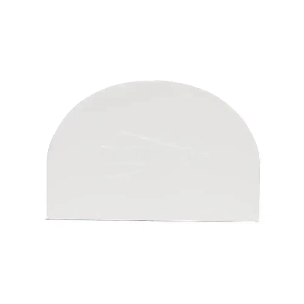 White half-moon-shaped object on a white background