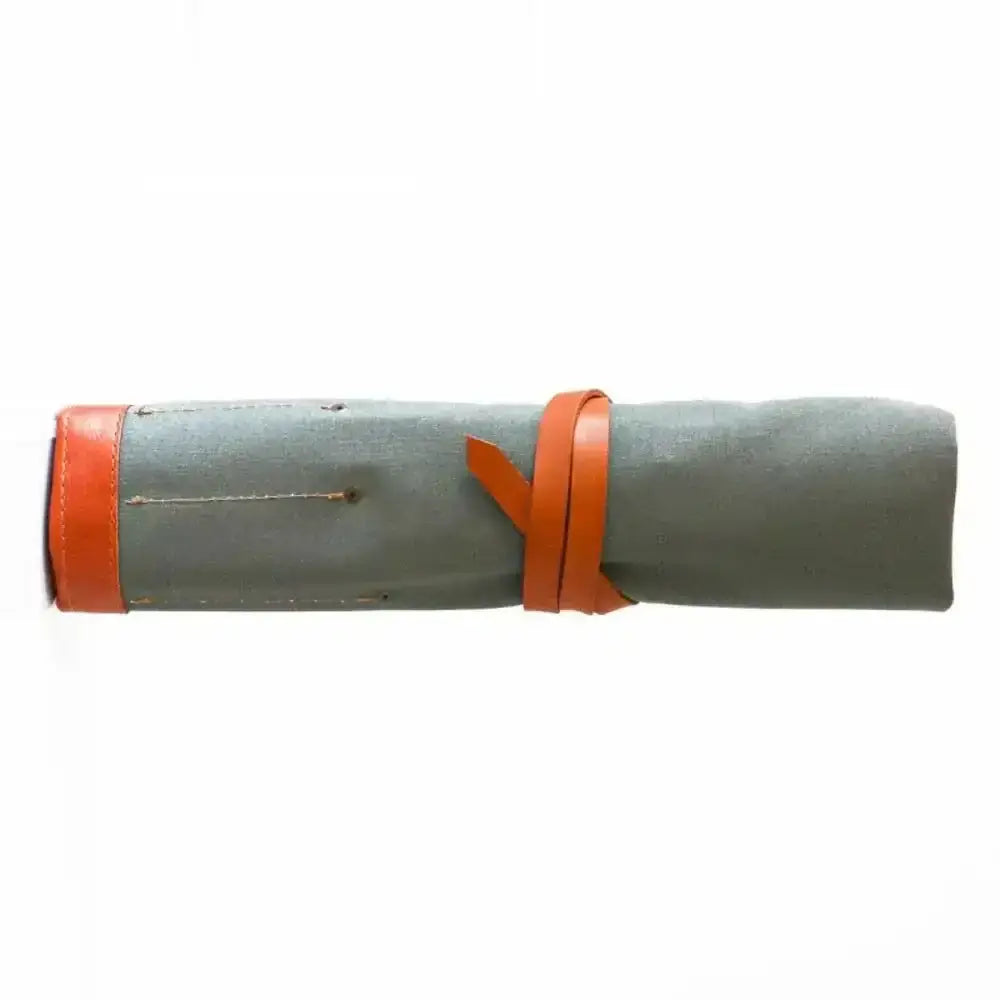Gray leather Pieter De Jager knife roll with orange leather straps made of canvas and leather materials