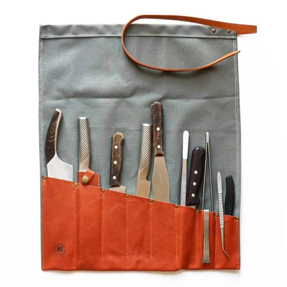 Pieter de jager knife roll canvas and leather grey with gray and orange leather, multiple slots holding kitchen tools
