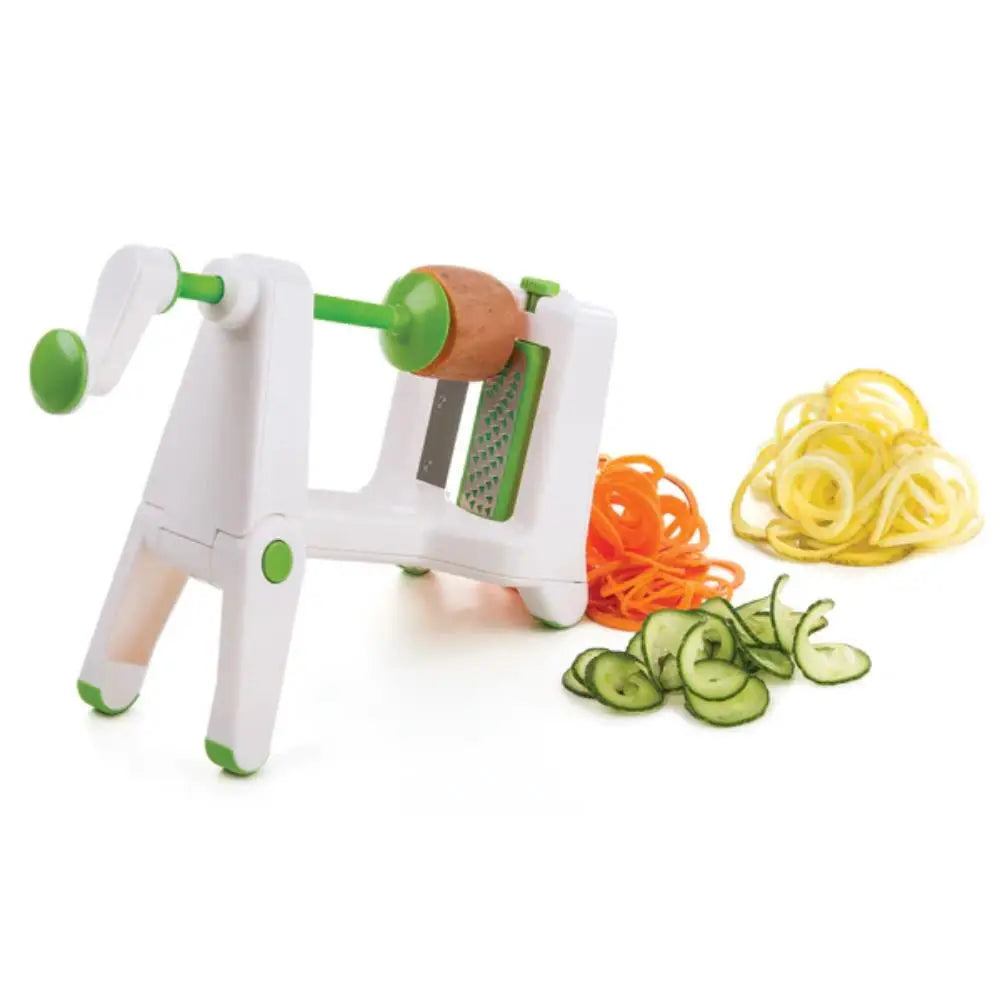 Vegetable spiralizer with sliced vegetables on a white background