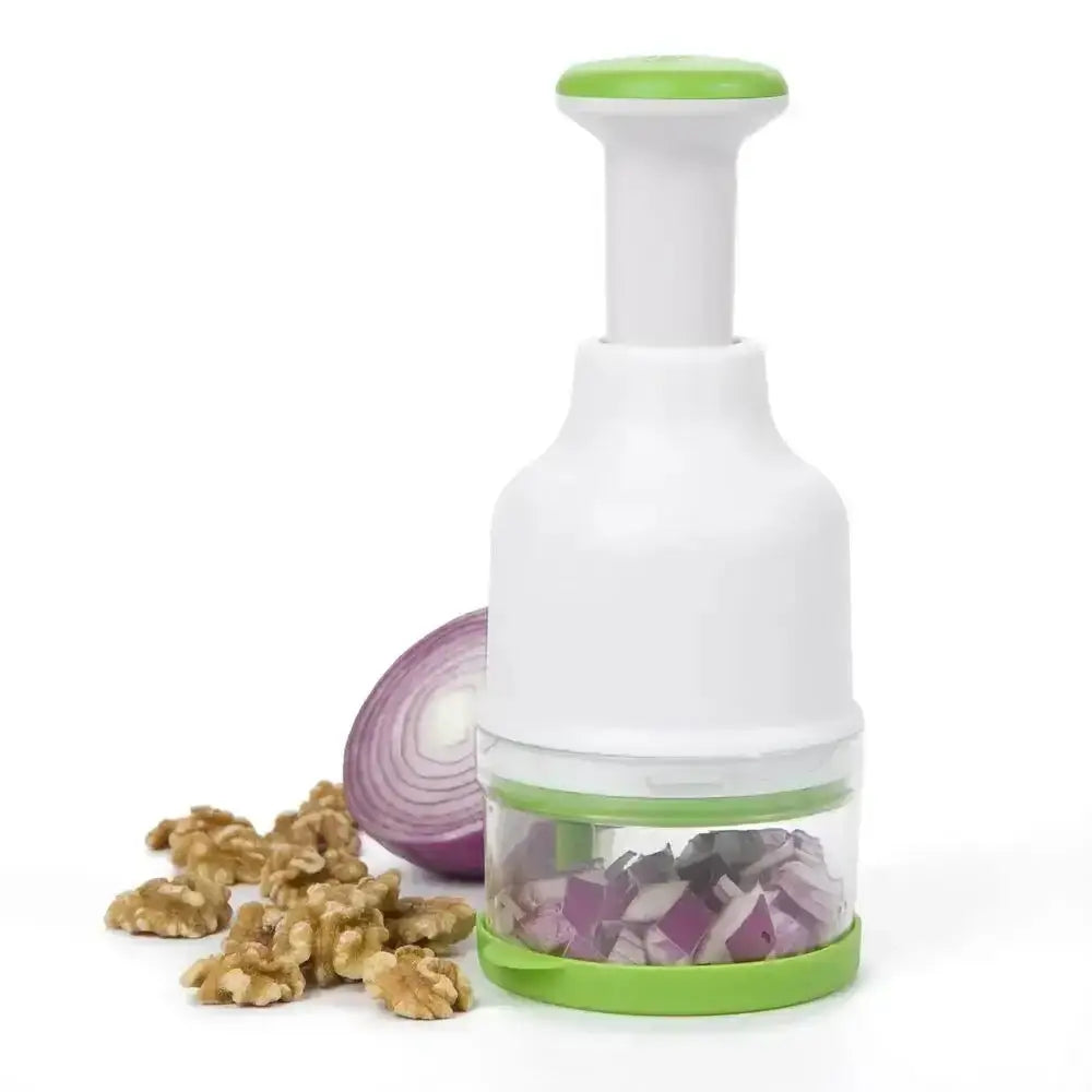 White and green kitchen tool with chopped onions on a white background