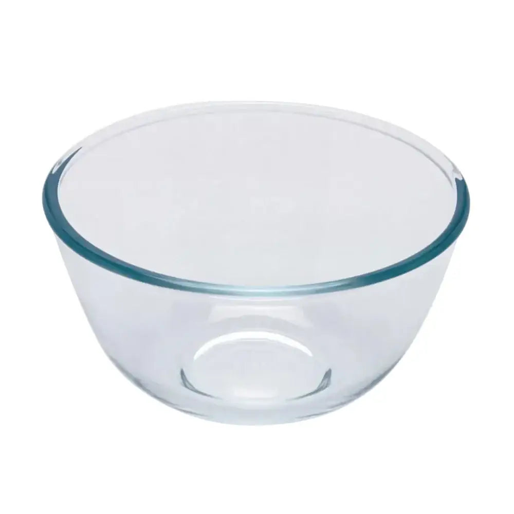 Clear glass mixing bowl on a white background