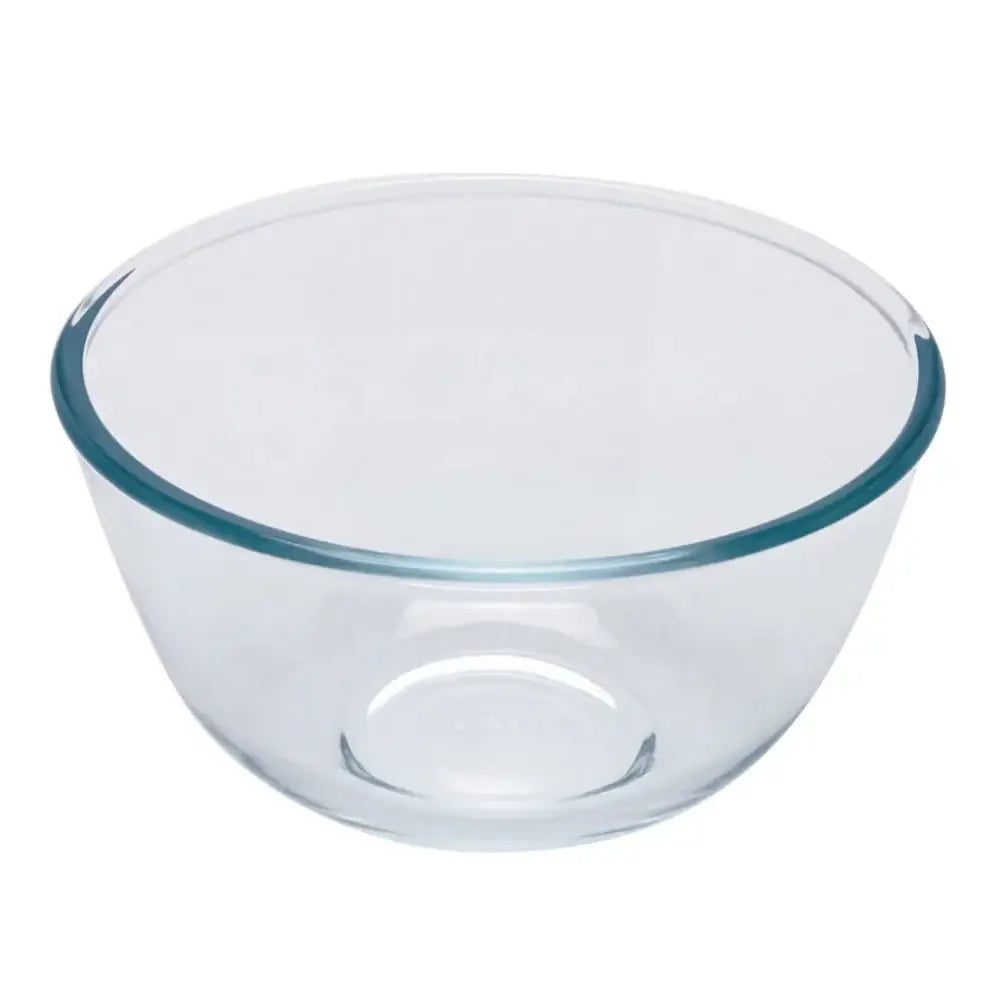 Clear glass mixing bowl on a white background