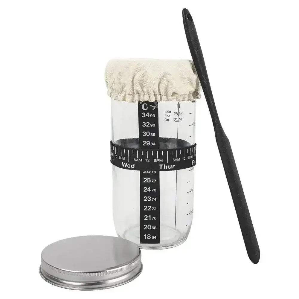 Regent sourdough starter jar kit 730ml clear glass jar with black markings beige fabric lid silver metal cap and black silicone spoon