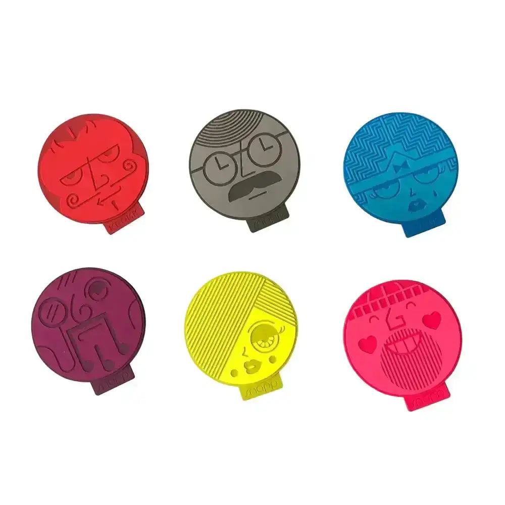 Colorful character-shaped clips on a white background