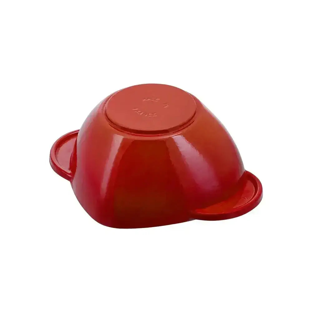 A vibrant red glossy staub cast iron cherry heart cocotte with two side handles and matching lid 1.75l