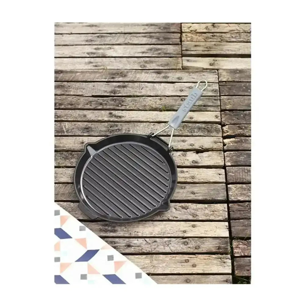 Cast iron grill pan on a wooden surface