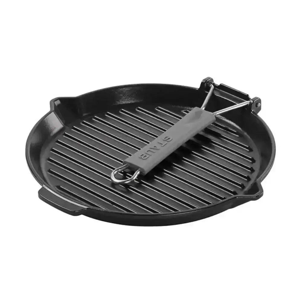 Black cast iron grill pan with handle on a white background