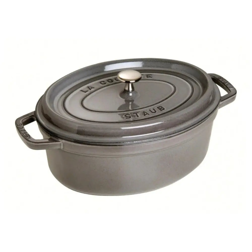 Staub oval cocotte with lid on a white background