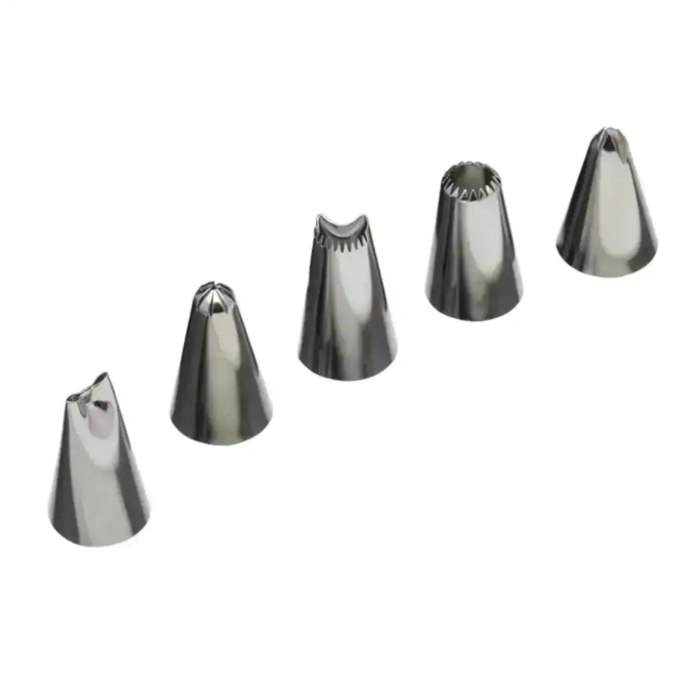 Set of five metal piping tips on a white background