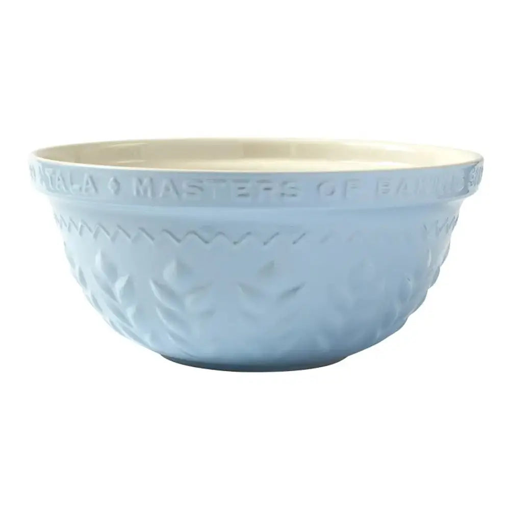 Light blue mixing bowl with beige interior on a white background