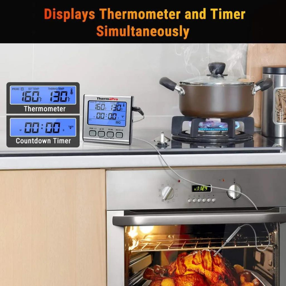 Digital thermometer and timer displaying temperature and time on a kitchen counter with a pot and oven.