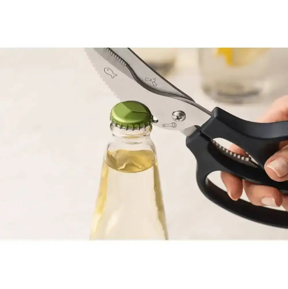 Bottle cap removal tool being used on a bottle with a white background