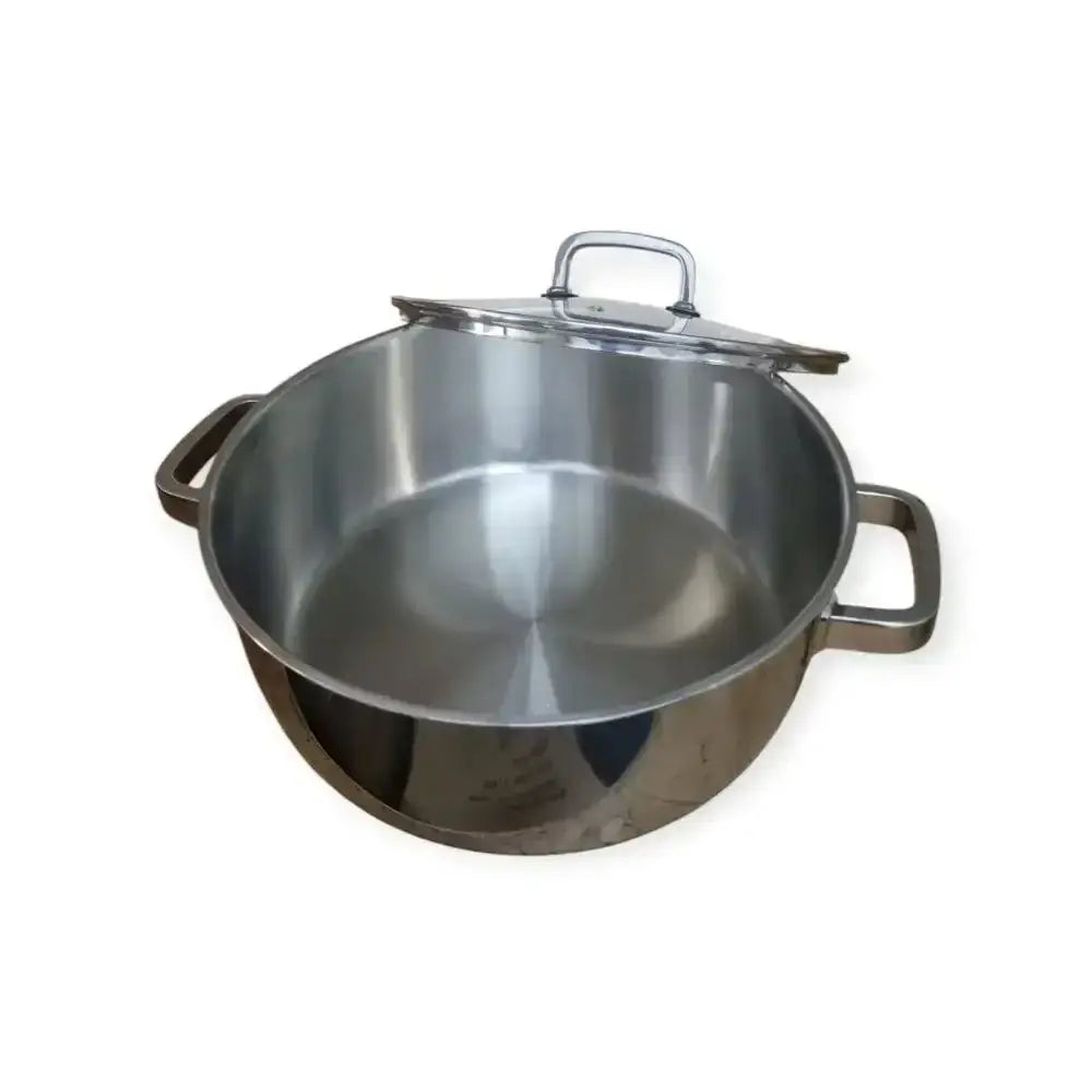 Stainless steel pot with lid on a white background