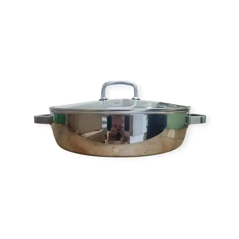 Stainless steel pot with lid on a white background