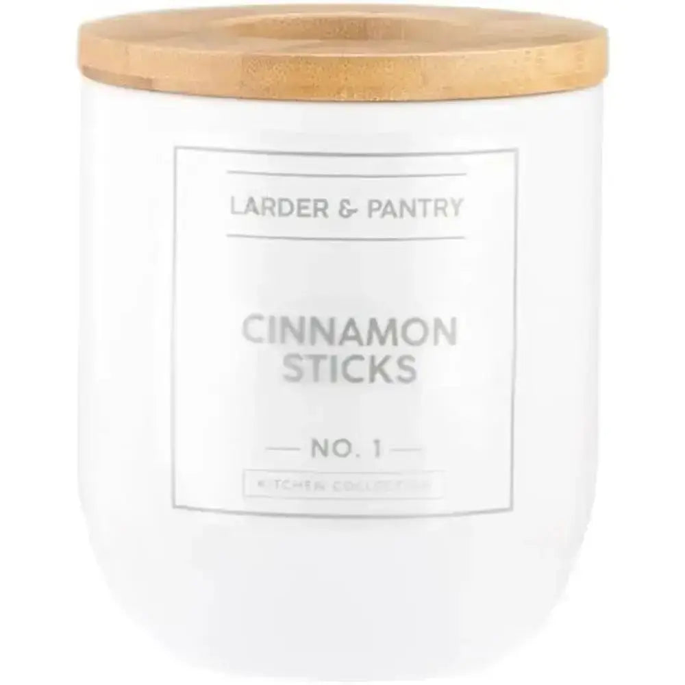 White ceramic candle jar with natural wood lid and minimalist cinnamon sticks label by larder & pantry 500ml canister