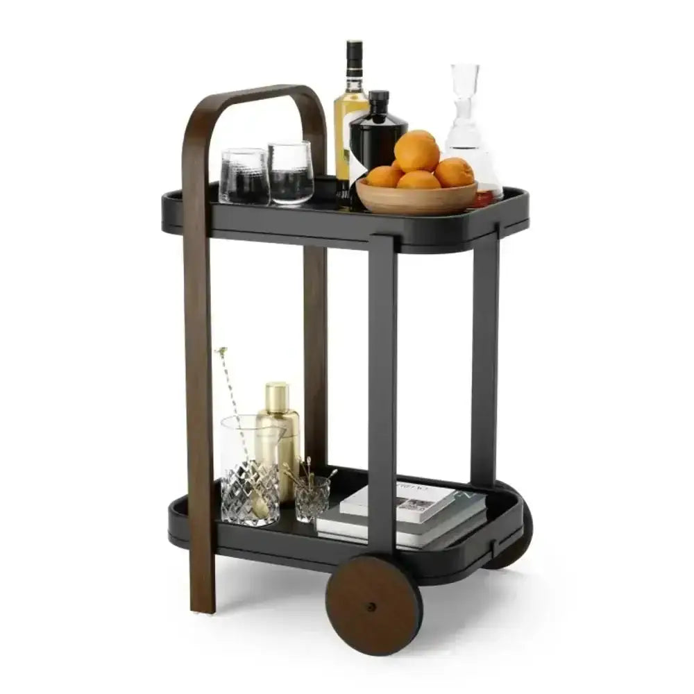 Black bar cart with drinks and fruits on a white background