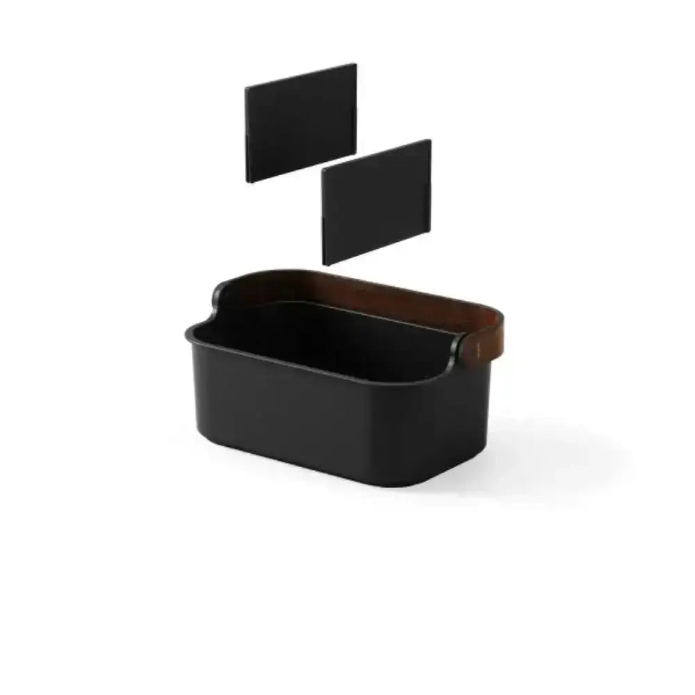Black rectangular container with a wooden lid on a white background