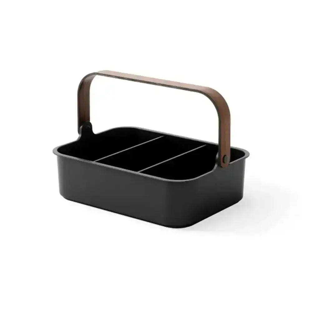 Black carrying basket with a wooden handle on a white background