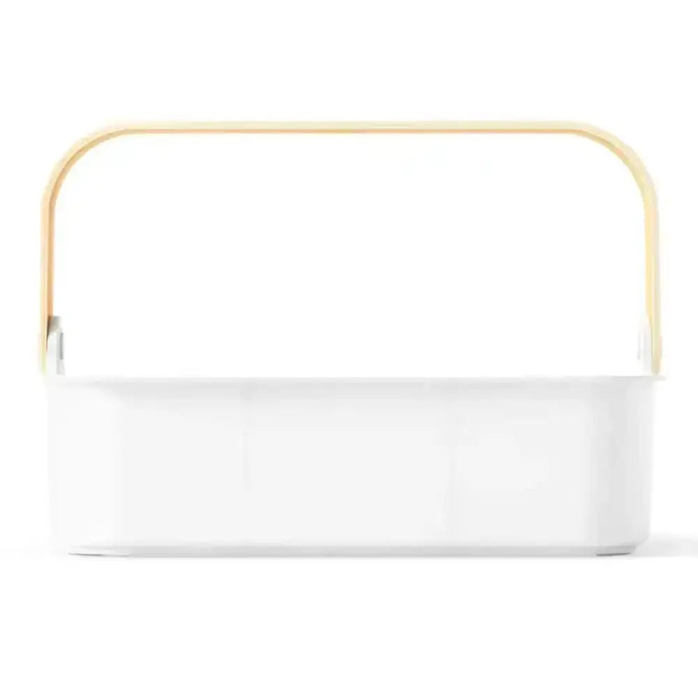 White rectangular basket with gold handle on a white background