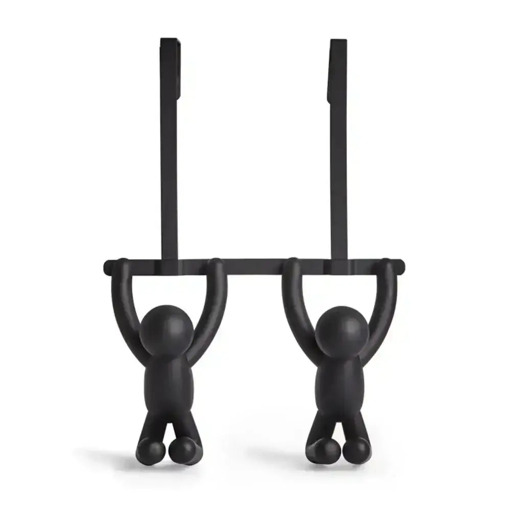 Black wall hooks shaped like people hanging from a bar on a white background