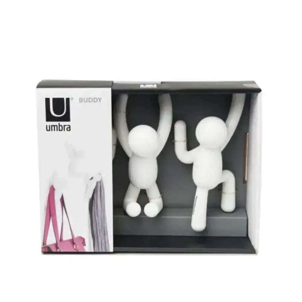 Umbra Buddy lamp packaging with two white figures on a white background