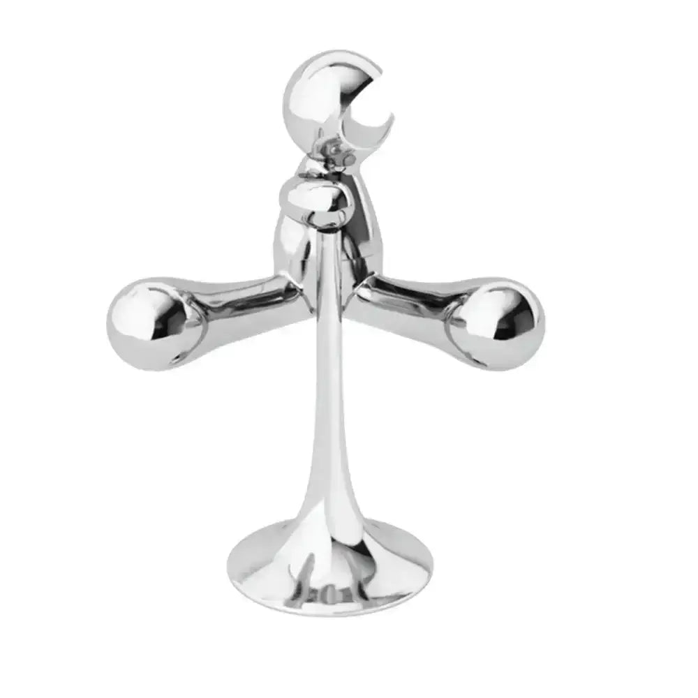 Silver balance scale figurine on a white background