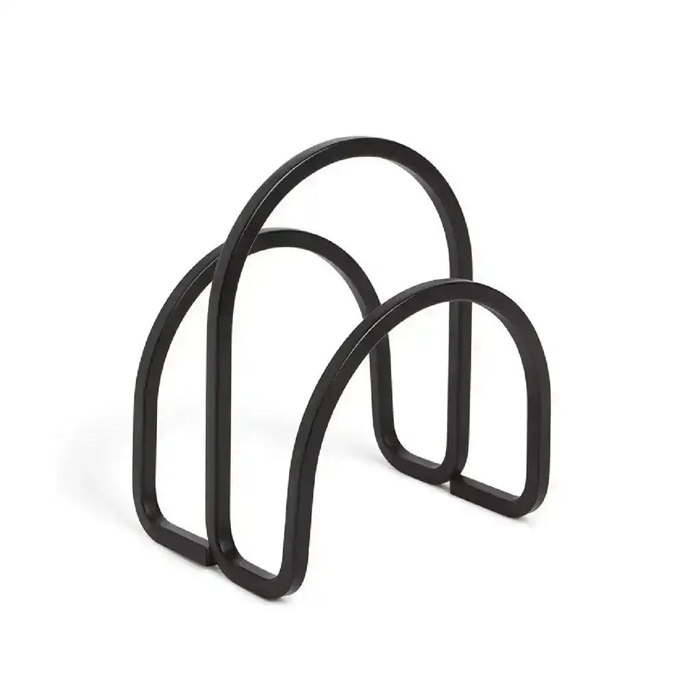 Black metal object with three arches on a white background