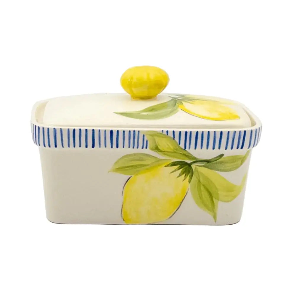 Decorative ceramic butter dish with lemon design on a white background