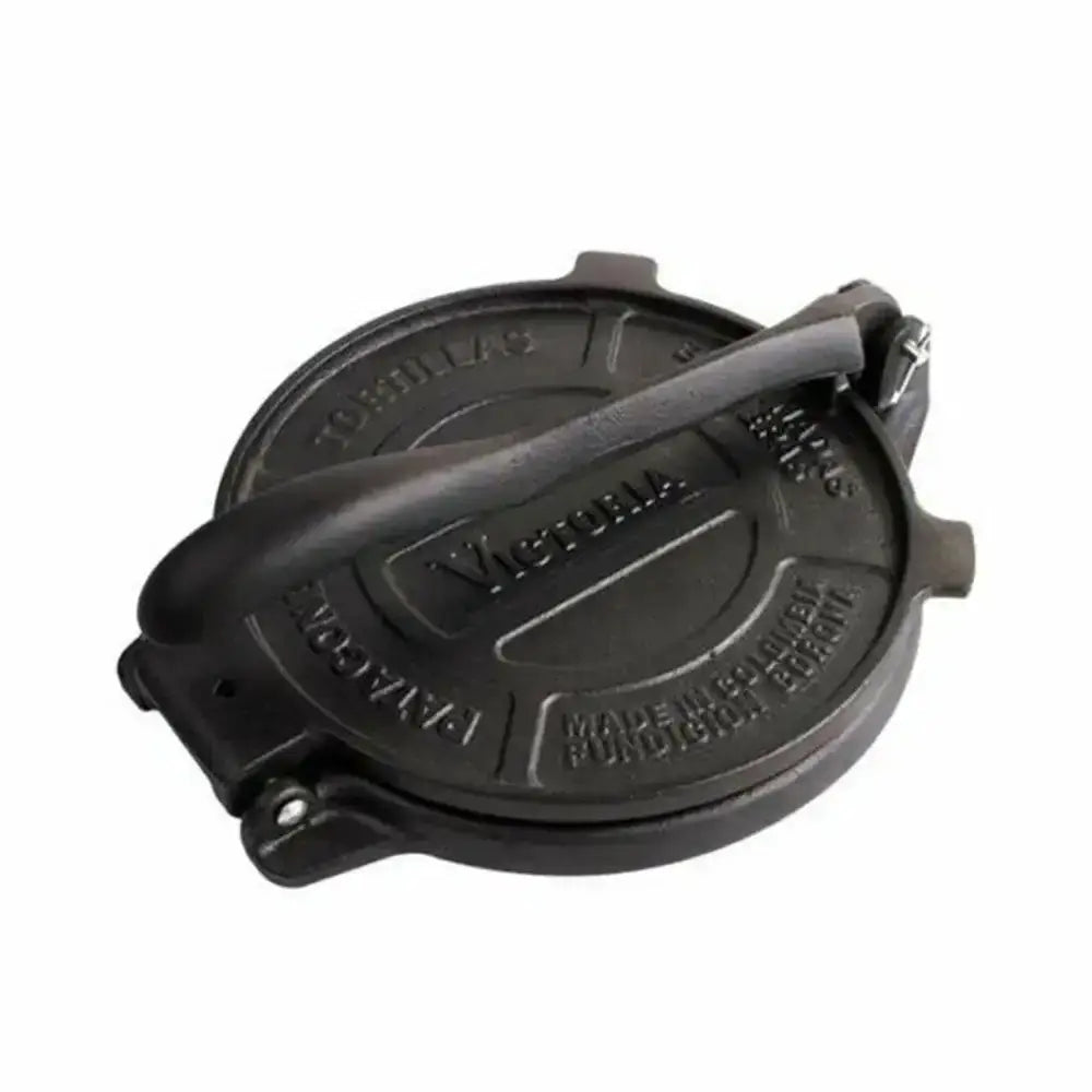 Black cast iron tortilla press with 'Victoria' branding on a white background