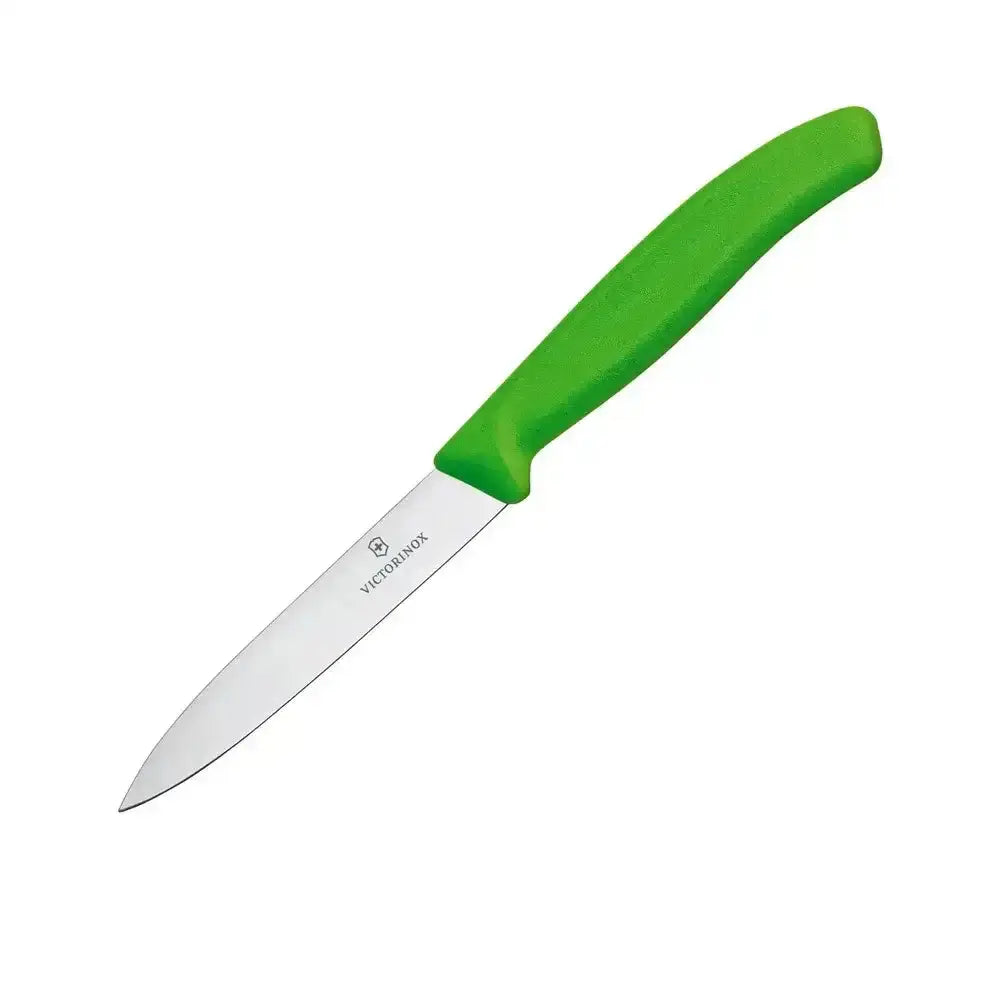 Paring knife with green handle on a white background