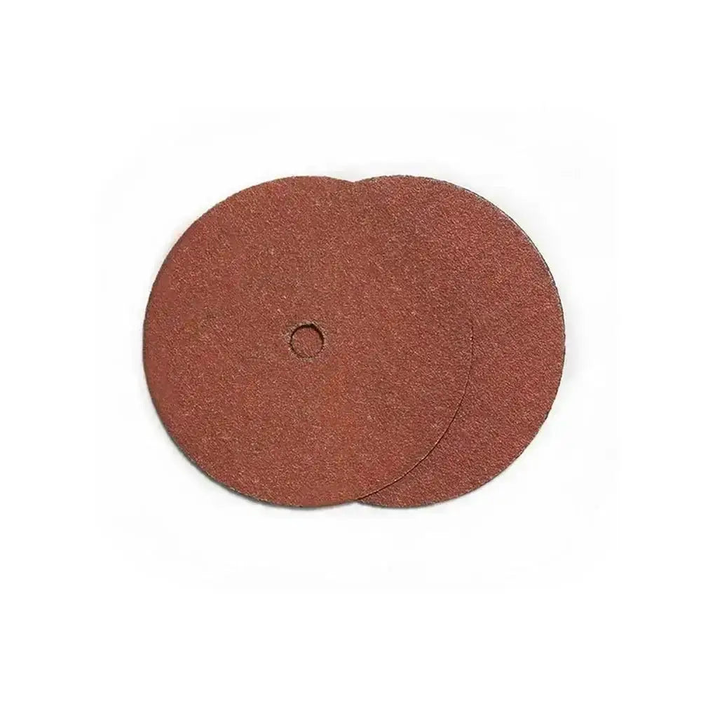 Two sanding discs with a red abrasive surface on a white background