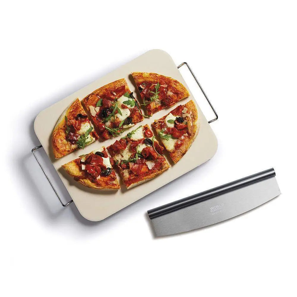 Sliced pizza on a stone with a metal peel on a white background