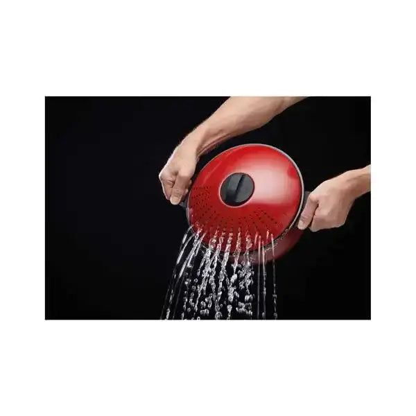 Red silicone-coated non-stick pasta pot with black handle and central knob from World of Flavours 26cm