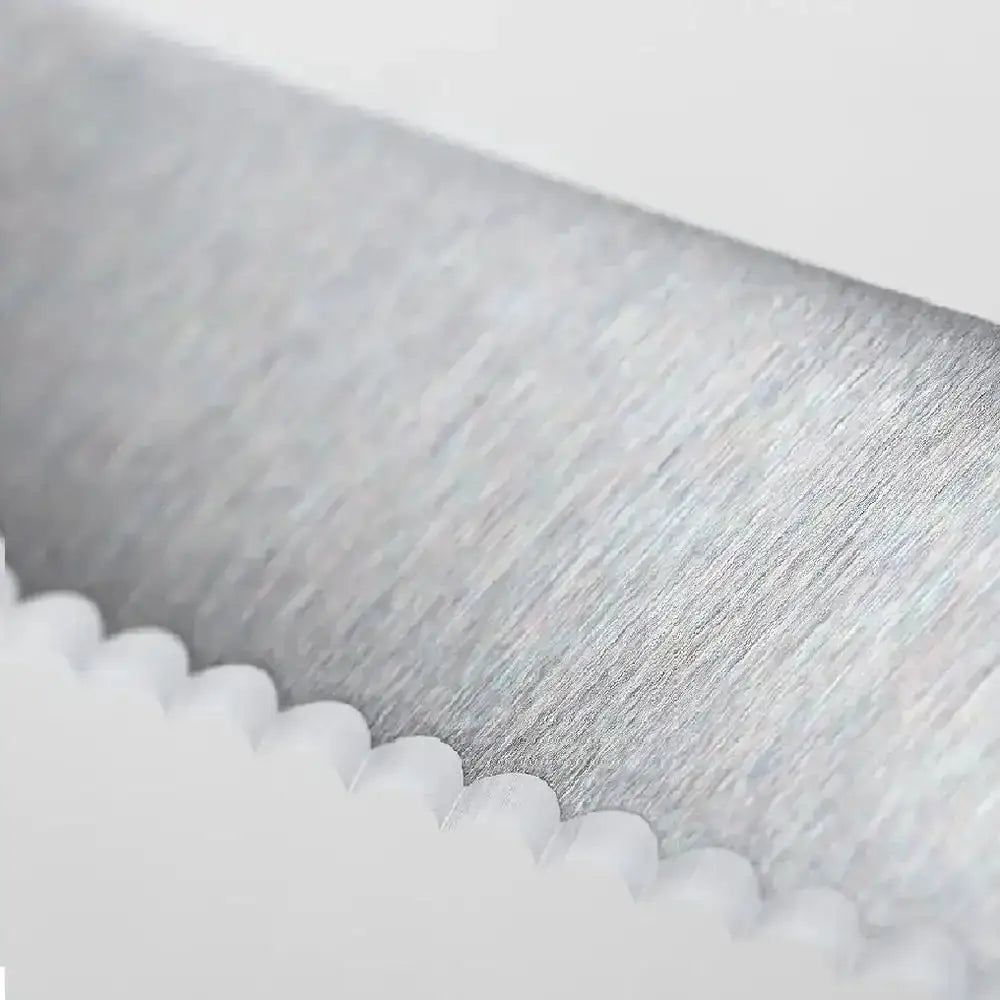 Close-up of a metal surface with a textured pattern