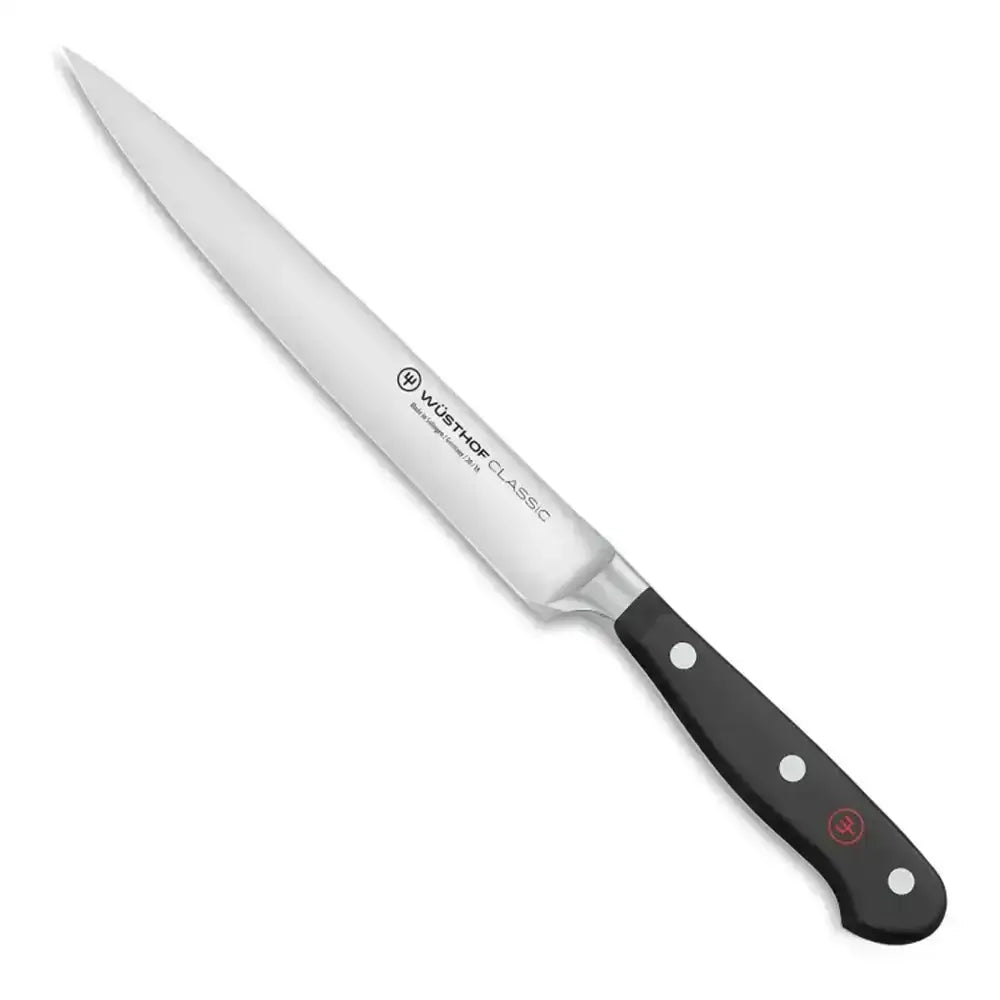 Forked knife with black handle on a white background
