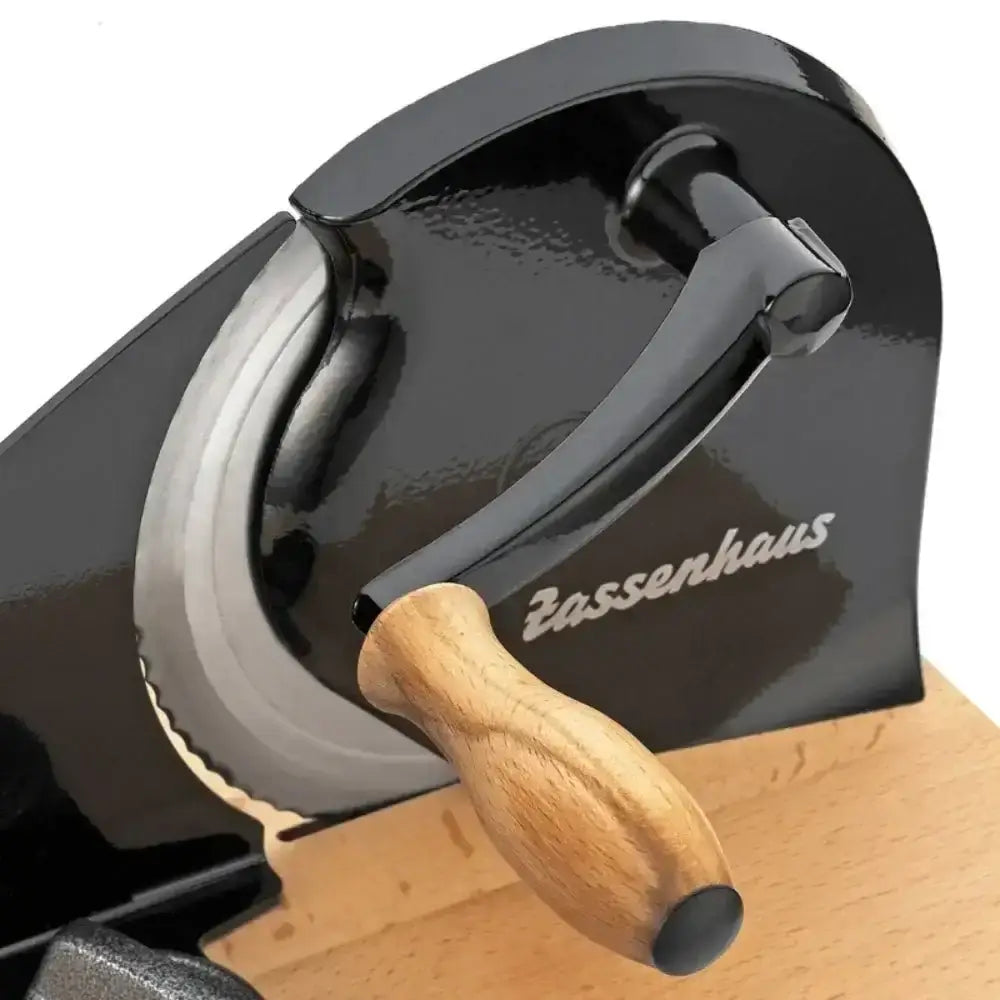 Black kitchen tool with wooden handle on a white background