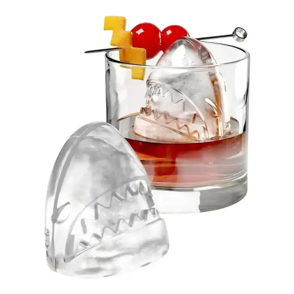 Clear shark-shaped ice cube tray with detailed teeth and open mouth design from zoku shark ice ball moulds 2pc