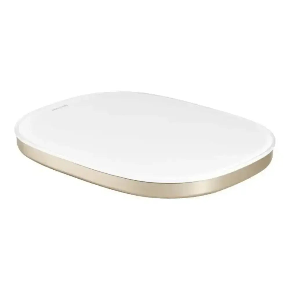 White and gold electronic device on a white background