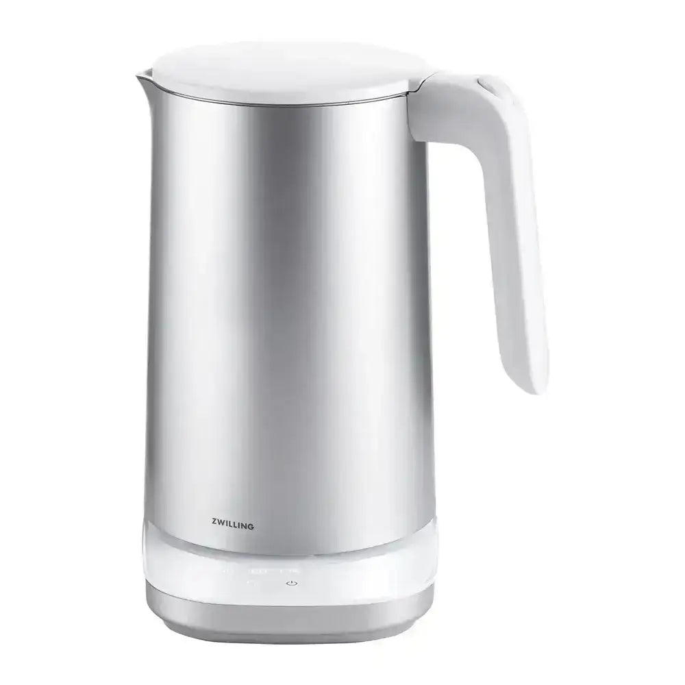 Silver and white electric kettle on a white background