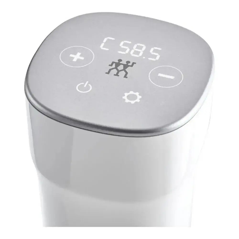 Silver electronic device with digital display and control buttons on a white background