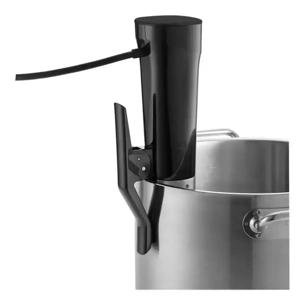Black faucet on a stainless steel pot against a white background
