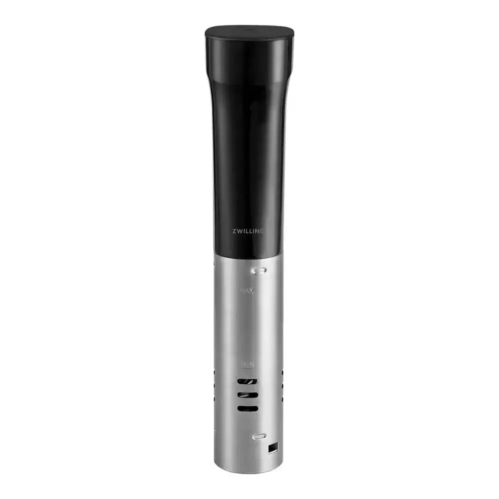 Black and silver pepper grinder on a white background