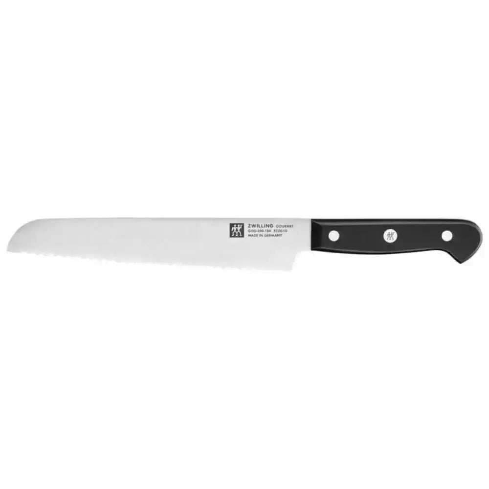 Knife with a black handle on a white background